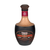 Front view of Tres Generaciones Anejo Tequila bottle with decorative label and cork stopper