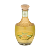 Detail close-up of Tres Generaciones Reposado Tequila bottle with cork stopper and gold accents