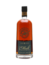 Front view of Parker's Heritage 8 Year Old Straight Malt whiskey bottle with amber color and black label.
