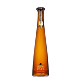 Front view of Don Julio 1942 Anejo Tequila in a tall amber glass bottle