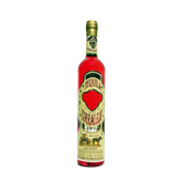 Front view of Corralejo Anejo Tequila bottle with decorative label and gold cap