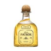 Detail shot of the Patrón Anejo tequila bottle with a cork stopper and gold label on a white background