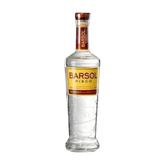 Front view of a clear liquor bottle with a gold cap and label on a white background