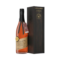 304 Liquor Little Book Chapter 10 All the Wiser whiskey bottle with its dark wooden presentation box