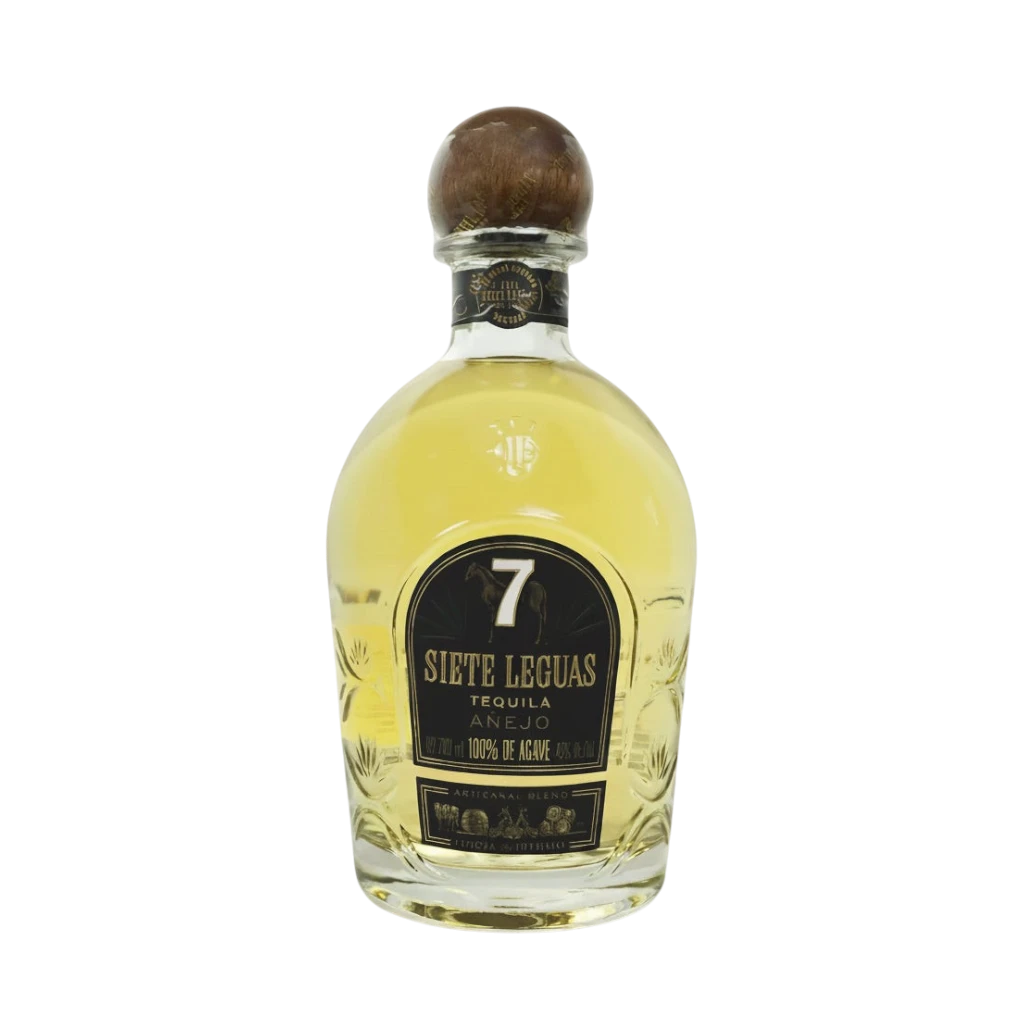 304 Liquor Siete 7 Leguas Anejo Tequila in a clear glass bottle with a wooden stopper and black label