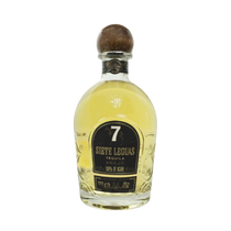 304 Liquor Siete 7 Leguas Anejo Tequila in a clear glass bottle with a wooden stopper and black label