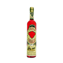 Front view of Corralejo Anejo Tequila bottle with decorative label and gold cap