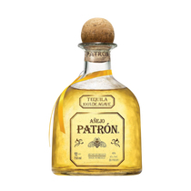 Detail shot of the Patrón Anejo tequila bottle with a cork stopper and gold label on a white background