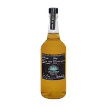 Front view of Casamigos Anejo Tequila bottle with a gold and black label.