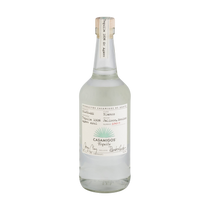 Front view of Casamigos Blanco Tequila in a clear glass bottle with a cork stopper