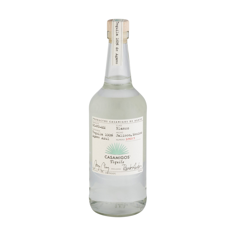 Front view of Casamigos Blanco Tequila in a clear glass bottle with a cork stopper