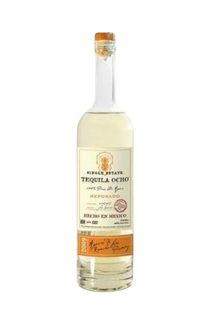 Front view of Tequila Ocho Reposado bottle with orange cap and label on a white background