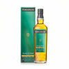 Front view of the tall green whisky bottle with a label design on a white background